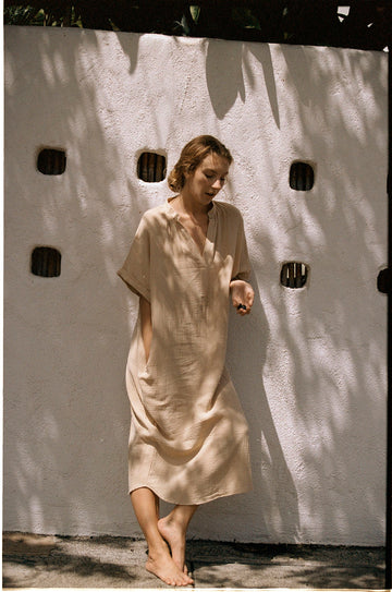 Tan loose-fitting dress with v-neck