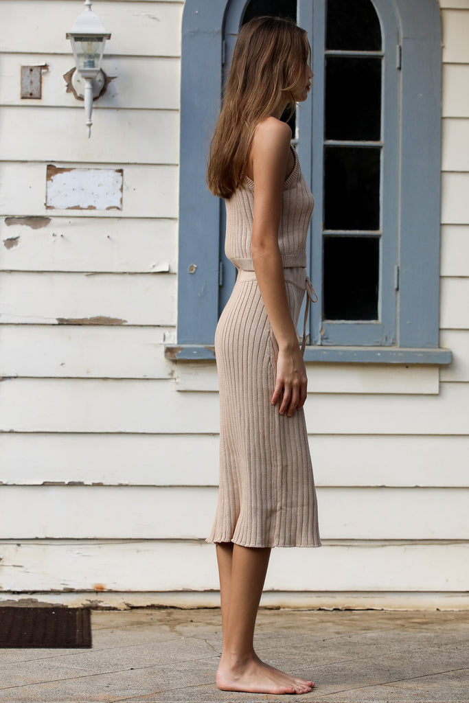 Tan rib-knit tank top and matching tan rib-knit skirt with drawstring side view